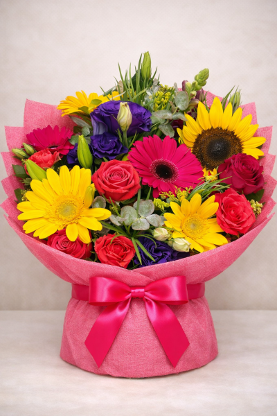Dani's Rainbow - A unique blend of textures and colours, this bouquet combines vibrant blooms. Perfect for those looking for a modern twist on the classic bouquet.
